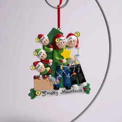 Family Of 5 Decorating Tree