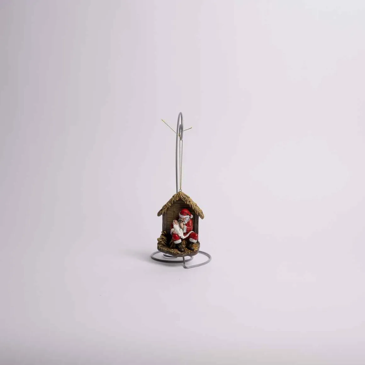 Kneeling Santa With Baby Jesus Ornament
