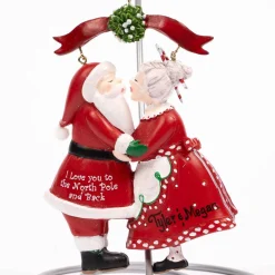 Santa And Mrs. Claus Under Mistletoe